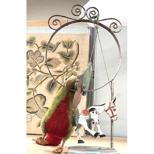 54 - An early 20th century mohair parrot, 40cm; a similar period rocking parrot toy; a metal puppet: ... 