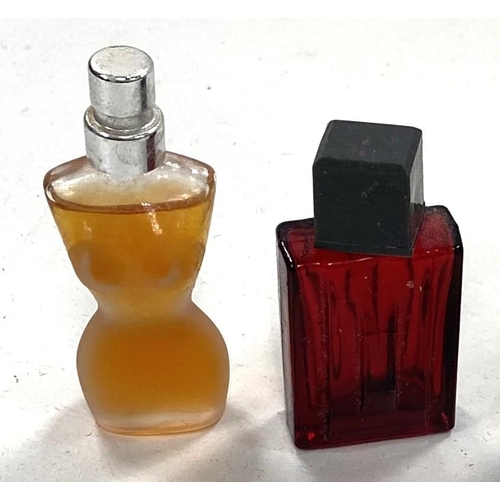 57 - A Victorian ruby glass scent bottle, 5cm; another; 2 miniature perfumes