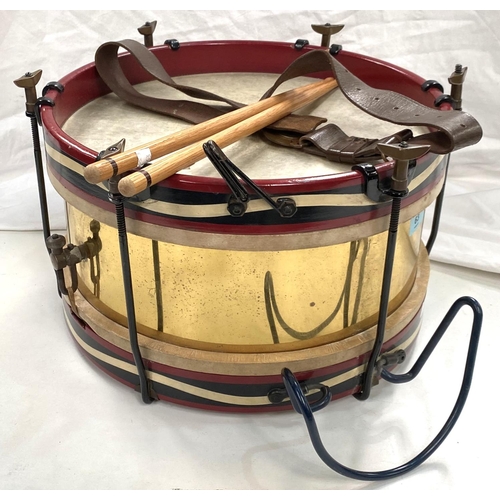 63 - A 20th century marching drum in brass, steel and painted wood, diameter 37cm; a Boys Brigade belt