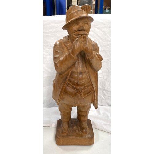 65 - A Black Forest carved wood figure of an elderly gentleman, 51cm