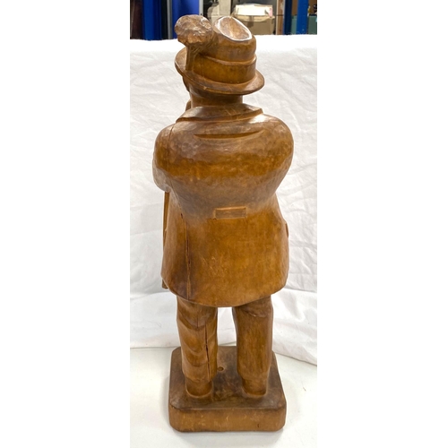 65 - A Black Forest carved wood figure of an elderly gentleman, 51cm