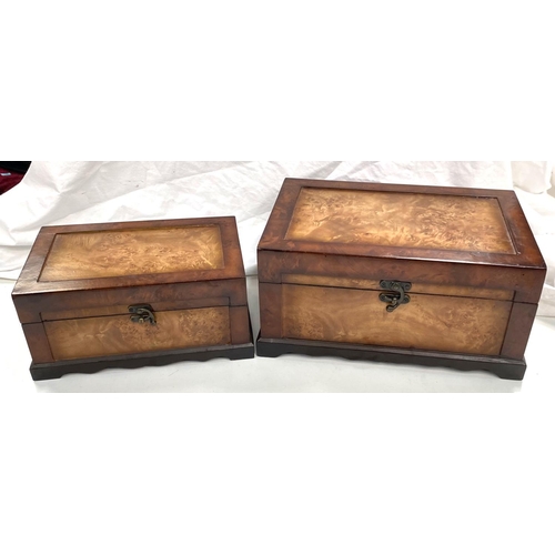 67 - A walnut veneered cigar box; a matching box