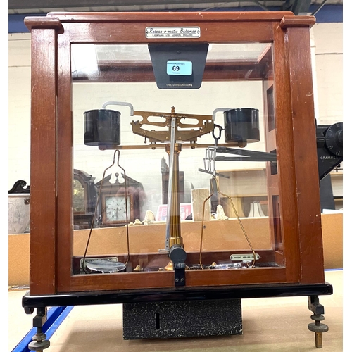 69 -  A scientific balance:  Release-o-Matic, by L Oertling, in mahogany case