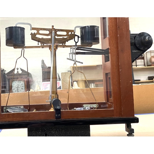 69 -  A scientific balance:  Release-o-Matic, by L Oertling, in mahogany case