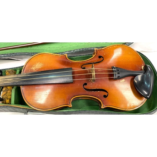 79 - A Czech Stradivarius pattern violin, with bow, in case 