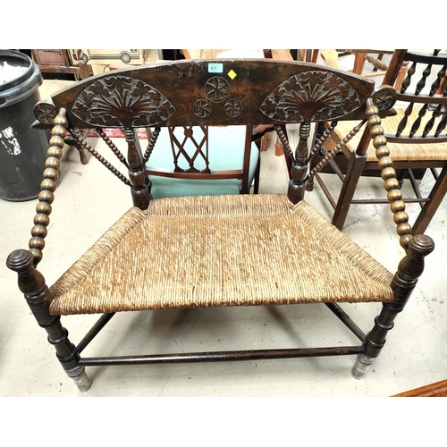 977 - An unusual late 19th/early 20th century turners 2 seater settee with carved back, extensive bobbin t... 