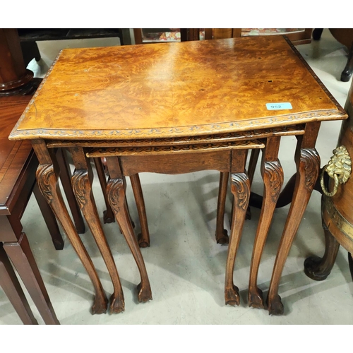 952 - A nest of 3 walnut reproduction occasional tables with cabriole legs and ball and claw feet