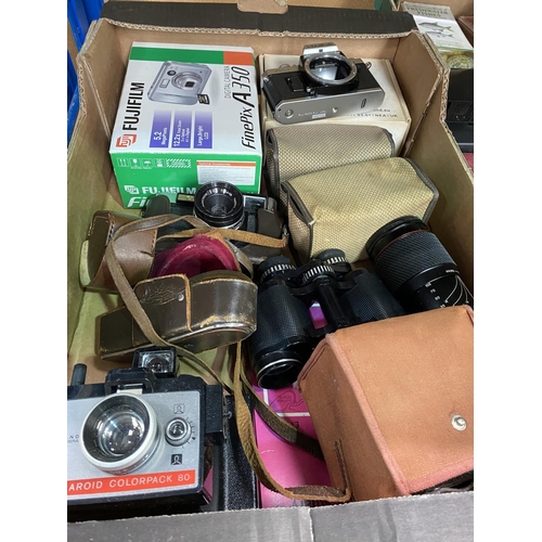 94 - A selection of various vintage cameras; lenses; binoculars; etc.