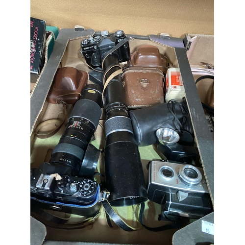 95 - Two Zenith vintage SLR cameras with long lenses; other cameras and equipment