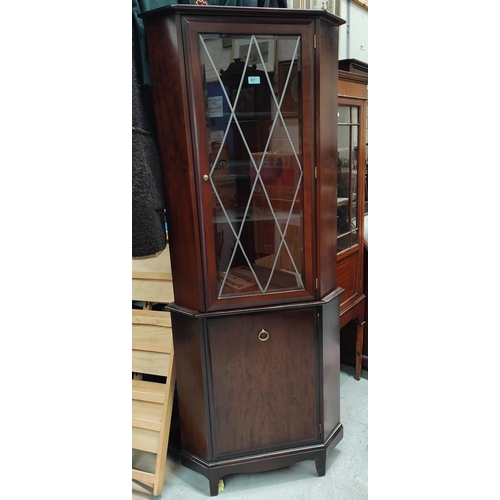 907 - A Stag full height corner cupboard with glazed upper section and cupboard bellow and a Stag glazed s... 