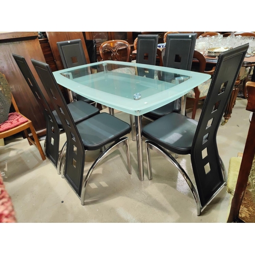 945 - A modern chrome and glass dining suite comprising rectangular table and 6 high back chairs in black ... 