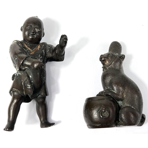 356D - Two Chinese bronze miniature figures of a young boy in robe, ht. 7cm; and a cat in hat playing drum ... 