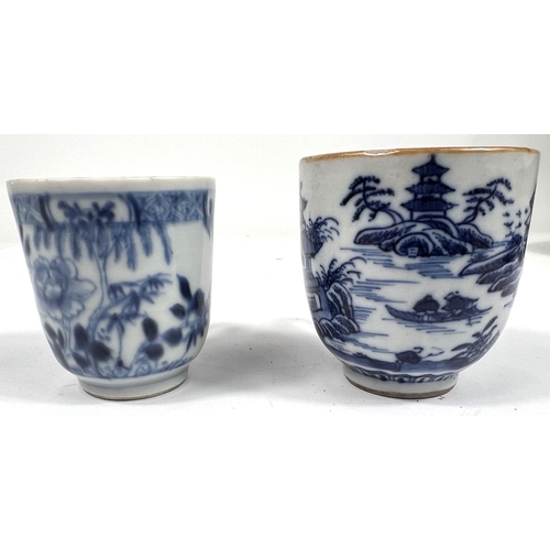 356G - A 19th century Chinese tea cup with blue and white decoration, another similar 6cm & 5.5cm