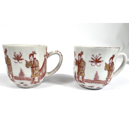 357A - A pair of Chinese 19th century tea cups with gilt and burnt orange decoration including internal dec... 