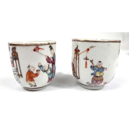 357B - Two Chinese 19th century similarly decorated tea cups with polychrome decoration of interior scenes ... 