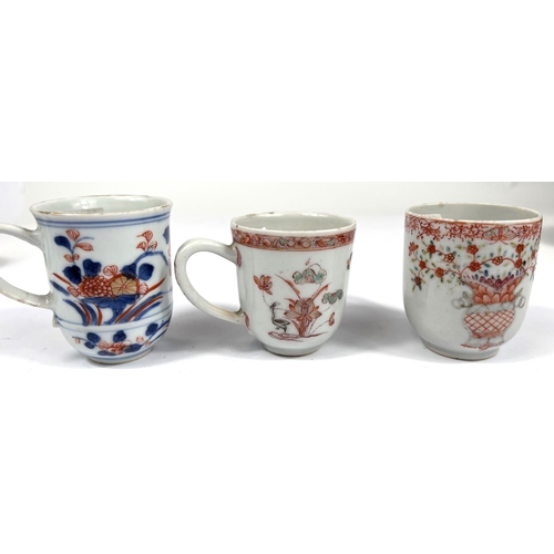 357C - Three Chinese tea cups with decoration of flowers etc, ht 7cm, 6.5cm, and 6cm