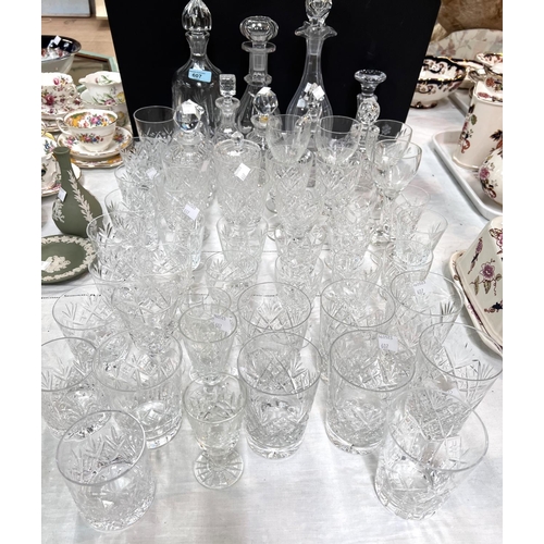 607 - A large selection of cut drinking glasses, decanter, jars etc; 2 silver plated gallery trays