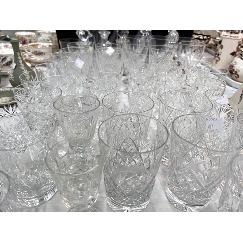 607 - A large selection of cut drinking glasses, decanter, jars etc; 2 silver plated gallery trays