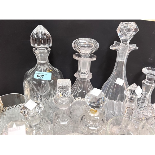 607 - A large selection of cut drinking glasses, decanter, jars etc; 2 silver plated gallery trays