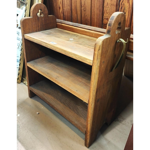 844 - An oak Arts and Crafts style shoe rack with brass shoe horn