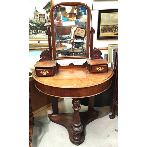 876 - A Victorian mahogany demi-lune dressing table with 2 jewellery drawers and under tier, on turned fro... 