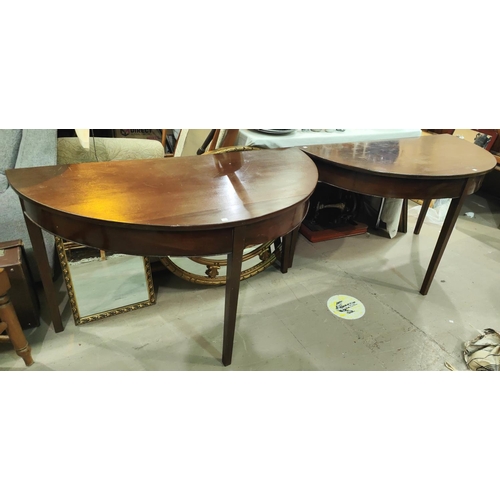 886 - A Georgian mahogany circular dining table formed from 2 demi-lune ends, 1 spare leaf, extended lengt... 