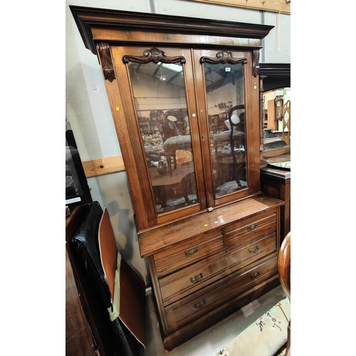 892 - A matched Victorian mahogany bookcase enclosed by 2 doors on later Edwardian chest of 2 long and 2 s... 