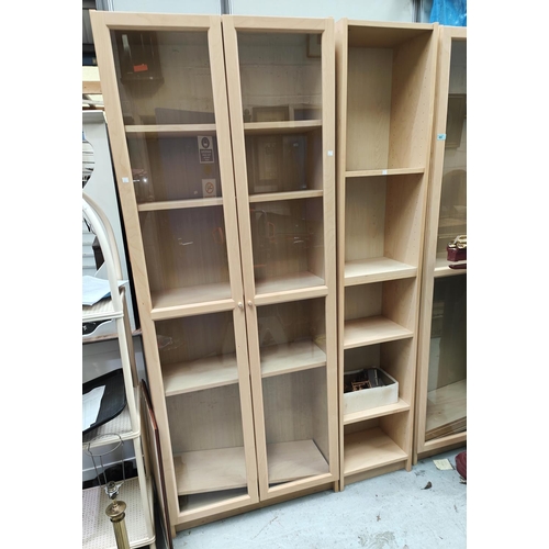 895 - A modern pale wood effect pair of book cases/ display cases with full height glazed doors and a matc... 