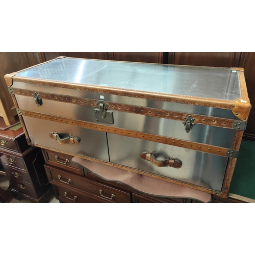 905 - A Timothy Oulton style designer 'steamer trunk' long low chest of brushed steel with tan leather bin... 