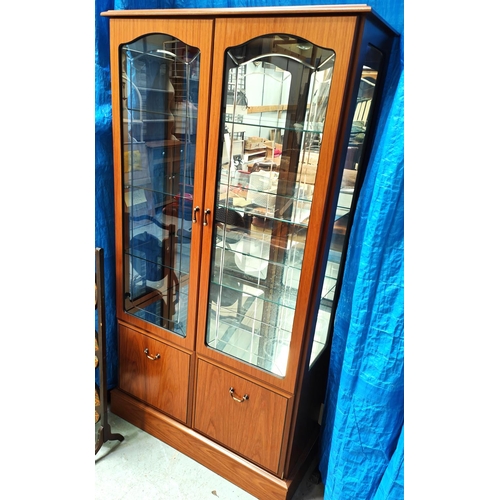 949A - A modern lightwood 4 door display cabinet