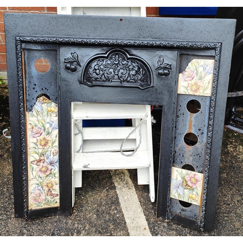 959 - A cast iron fire surround with space for tiles 94 x 94cm