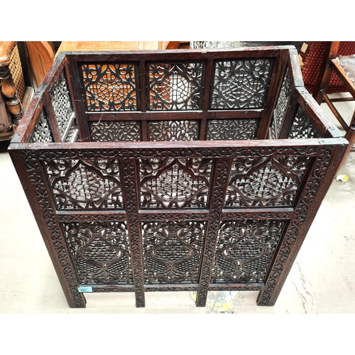 993 - An oriental carved hardwood folding occasional table base (no top)