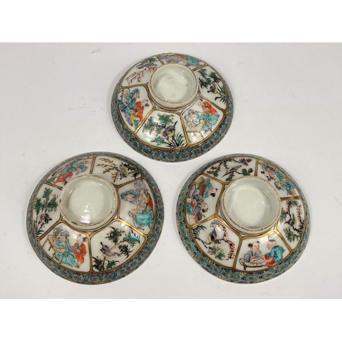 357F - Three matching Chinese ceramic short pedestal dishes with polychrome decoration to underside and pol... 