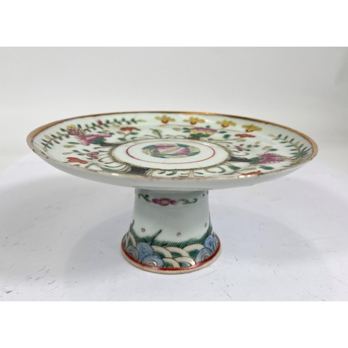 397 - A Chinese ceramic pedestal dish famille verte decoration, diameter 18cm, height 8cm (reglued chip)