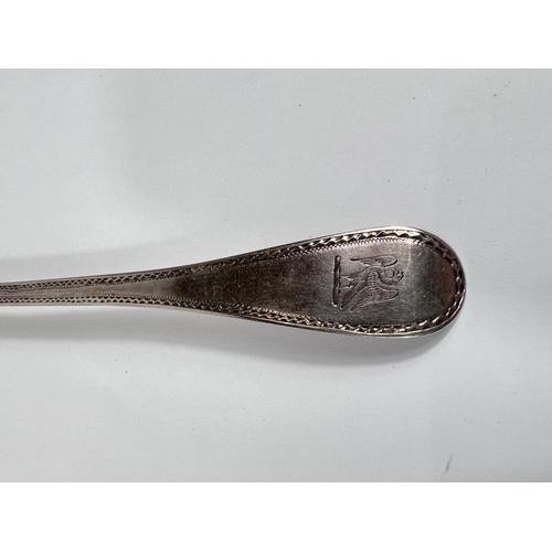 665 - A Georgian Old English pattern tablespoon with wrigglework border, London 1792, 1.5oz