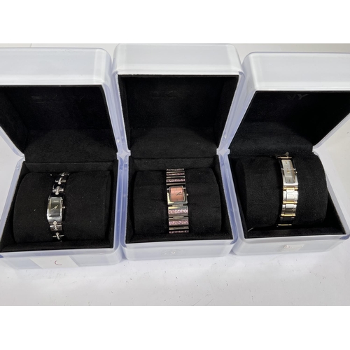 756 - Three ladies DKNY designer wristwatches, No NY34665, stainless steel set with pink stones boxed, No ... 