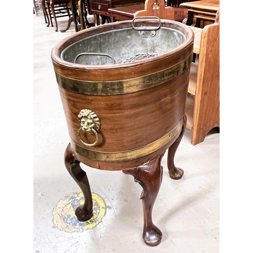 864 - A GEORGIAN STYLE WINE COOLER, brass bound mahogany with lion's mask handles, cabriole legs, 52cm