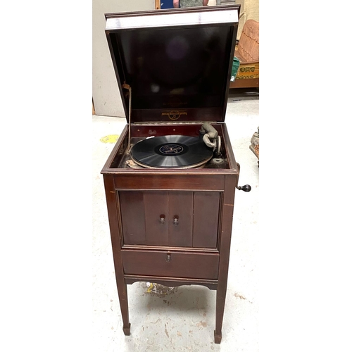 65A - A wind-up gramophone in mahogany case, Columbia floor standing model 124a