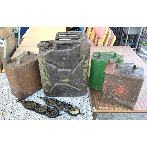 138A - A selection of vintage petrol cans, horse brasses etc