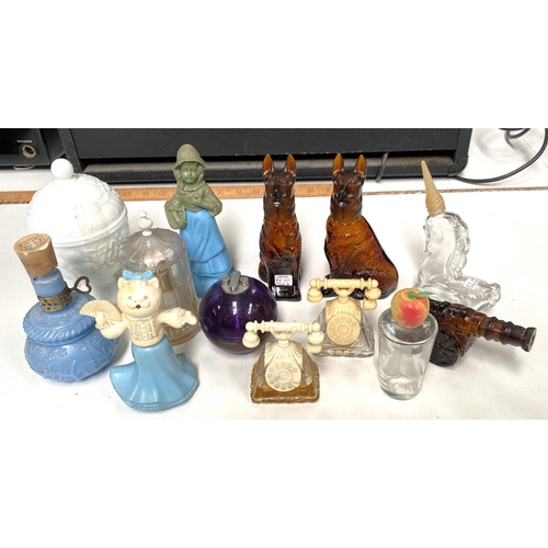 32C - A selection of vintage Avon and other scent bottles in the form of dogs etc