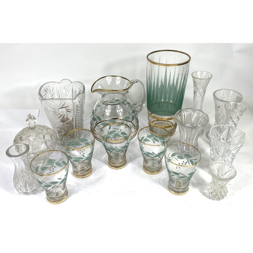 598 - A vintage lemonade set of 5 glasses and jug with gilt and green lesf decoration; a similar vase and ... 