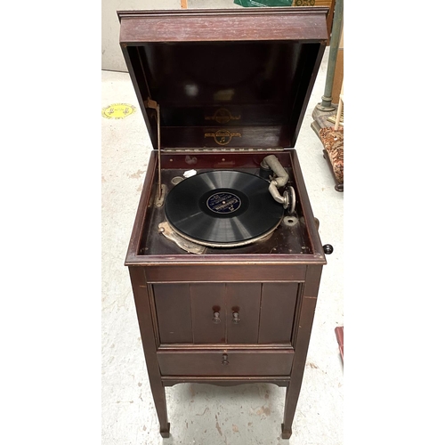 65A - A wind-up gramophone in mahogany case, Columbia floor standing model 124a