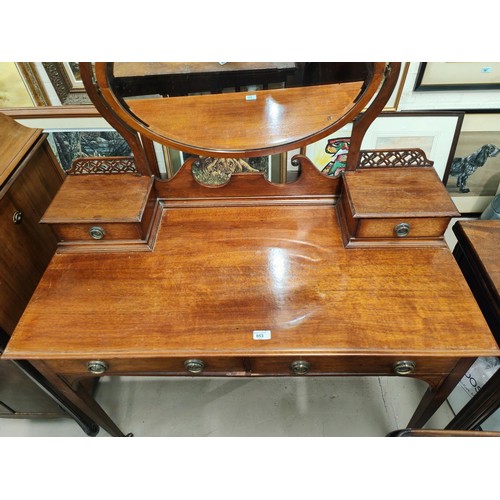 853 - An Arts & Crafts period kneehole mahogany dressing table with 2 drawers and 2 jewellery drawers ... 