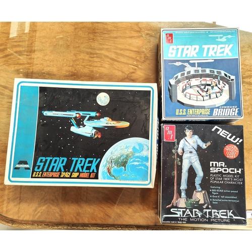 1 - Three vintage Star Trek un-assembled model kits in original boxes, 'amt U.S.S Enterprise Bridge', 'a... 