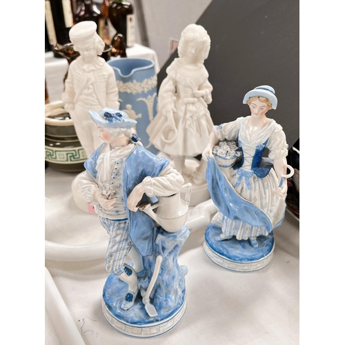 460 - A pair of Parianware children in 19th dress, two Meissen style figures, etc