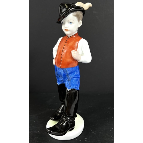 584C - A HEREND hand painted figure of a boy in cap with a feathered black cap, waistcoat and large black b... 