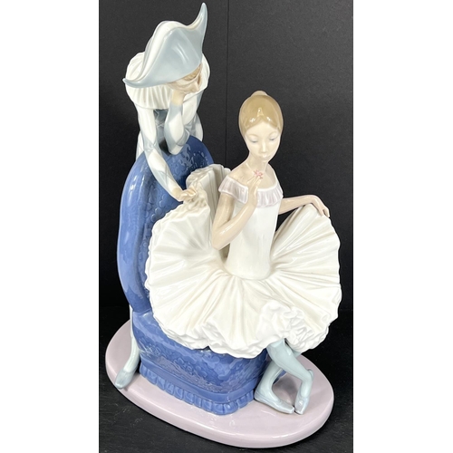 590 - A Nao Harlequin group with seated ballerina, ht 31cm