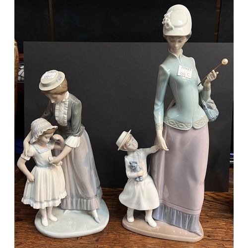 590C - A Lladro figure of group of mother and daughter and a similar group, no 5142