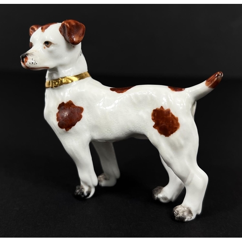 595C - A late 18th early 19th century Royal Crown Derby figure of a terrier dog with red crown sword mark, ... 