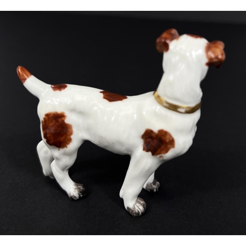 595C - A late 18th early 19th century Royal Crown Derby figure of a terrier dog with red crown sword mark, ... 